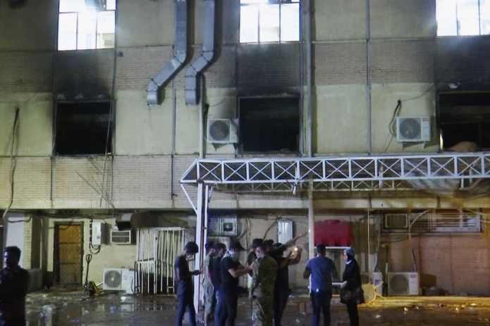 Fire at Iraq virus hospital leaves at least 50 dead