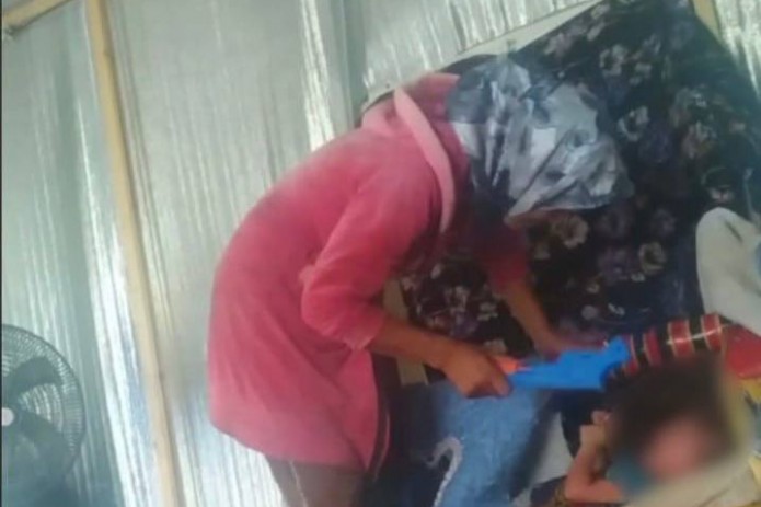 Buxoroda bolasini beshikka bog‘lagan holatda qiynab kelgan ayolga nisbatan jinoyat ishi qo'zg'atildi