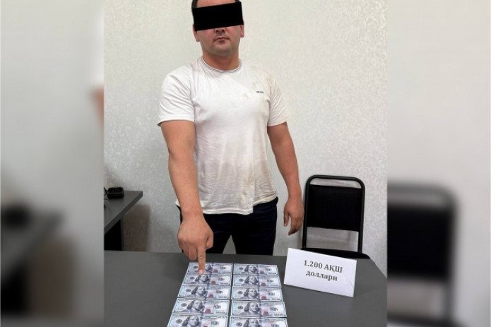 Oqqo‘rg‘onda kadastr xodimi 1200 dollar pora bilan qo‘lga tushdi