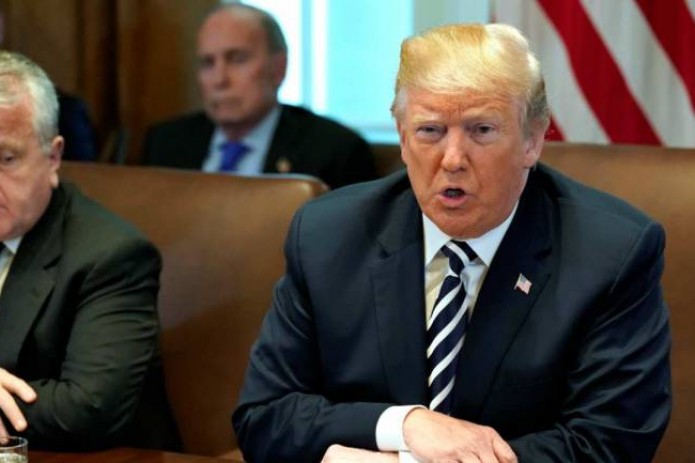 Trump asks regulators to help ZTE "get back into business, fast"