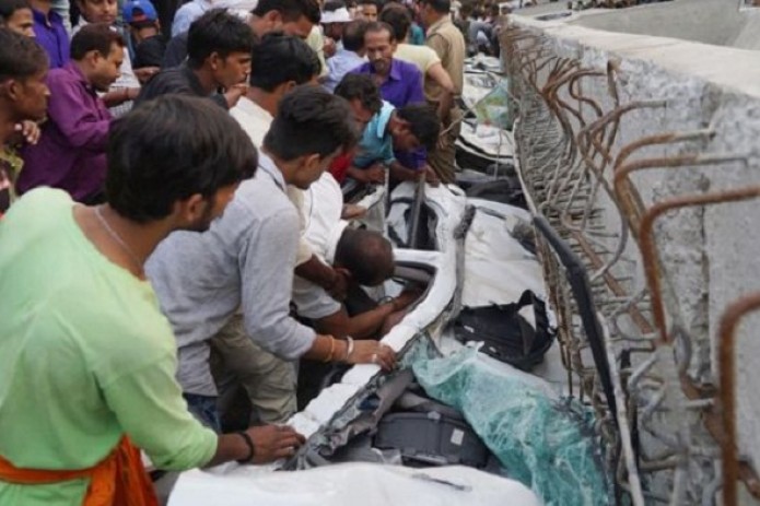 At least 16 reported dead, more trapped after flyover collapses in India - local media