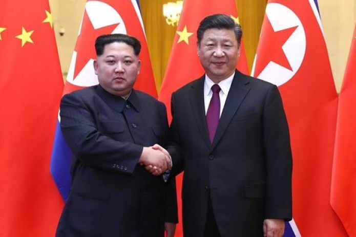 China says N.Korea pledges denuclearisation during friendly visit