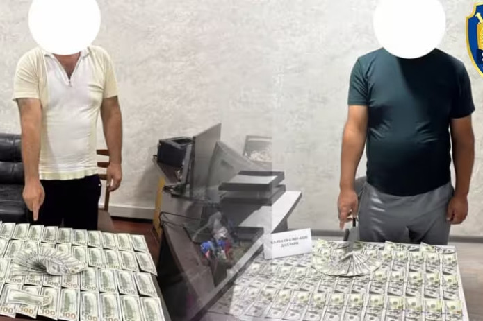 Namanganda qalbaki $20 mingni haqiqiy $14 mingga sotayotgan shaxs qo‘lga olindi