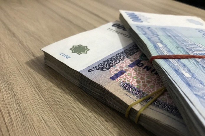 В 2021 году узбекистанцы с банковских карт обналичили 95 трлн. сумов